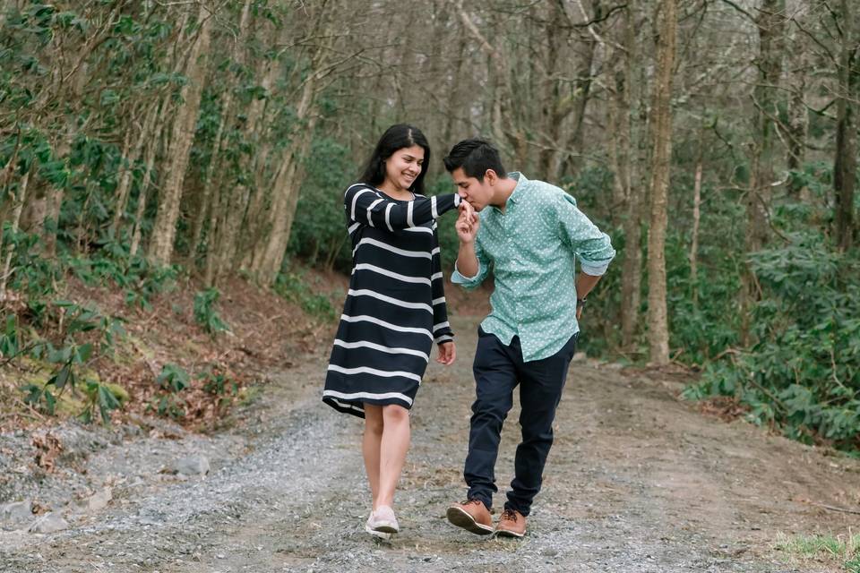Couple walking in woods