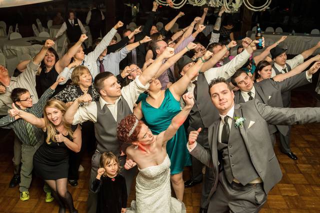 The couple with the wedding attendants