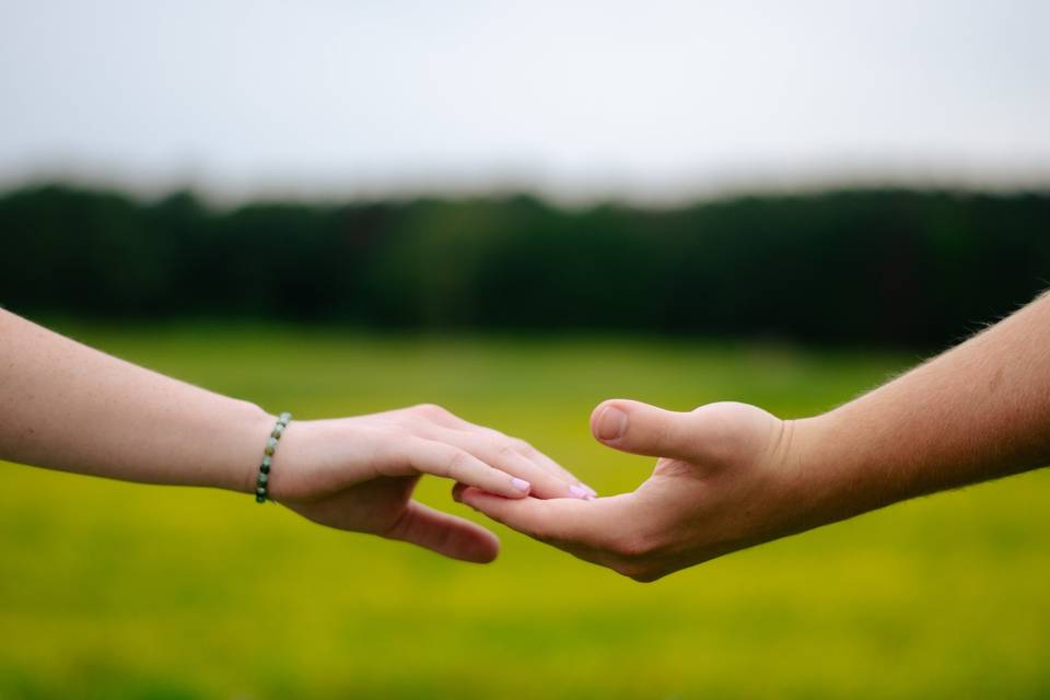 Couples hands touching