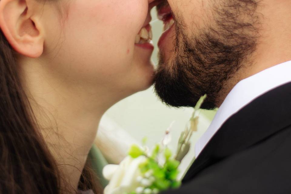 Bride + groom almost kissing