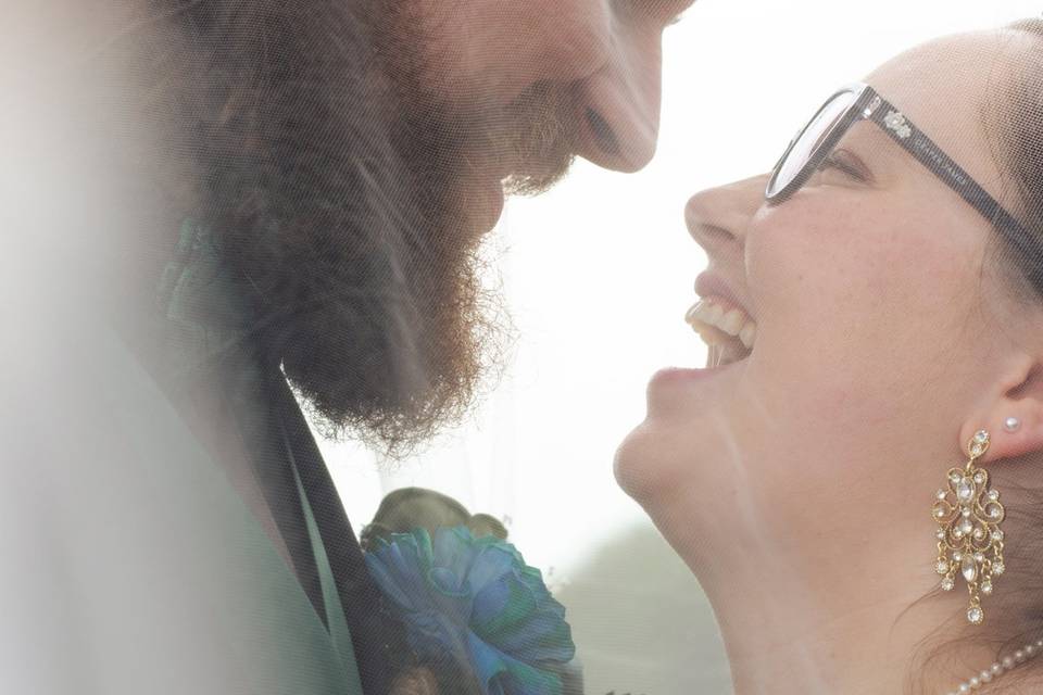 Bride + groom laughing