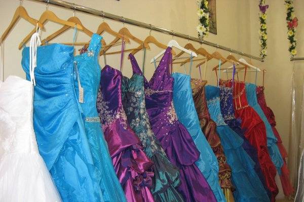 Here are a few of our Quinceanera Dresses. We currently have four lines to choose from. I just love the colors!