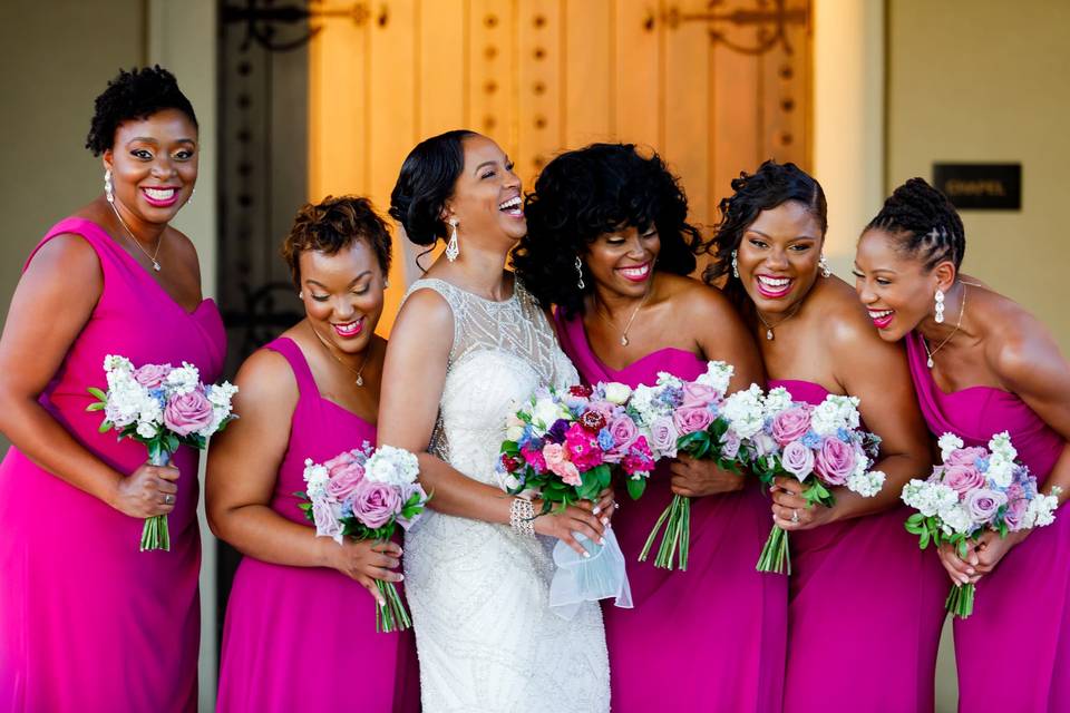 Bride & bridesmaids laughing