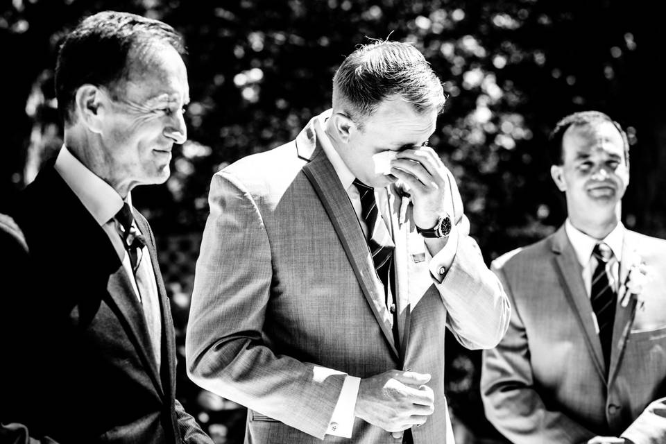 Groom crying during ceremony