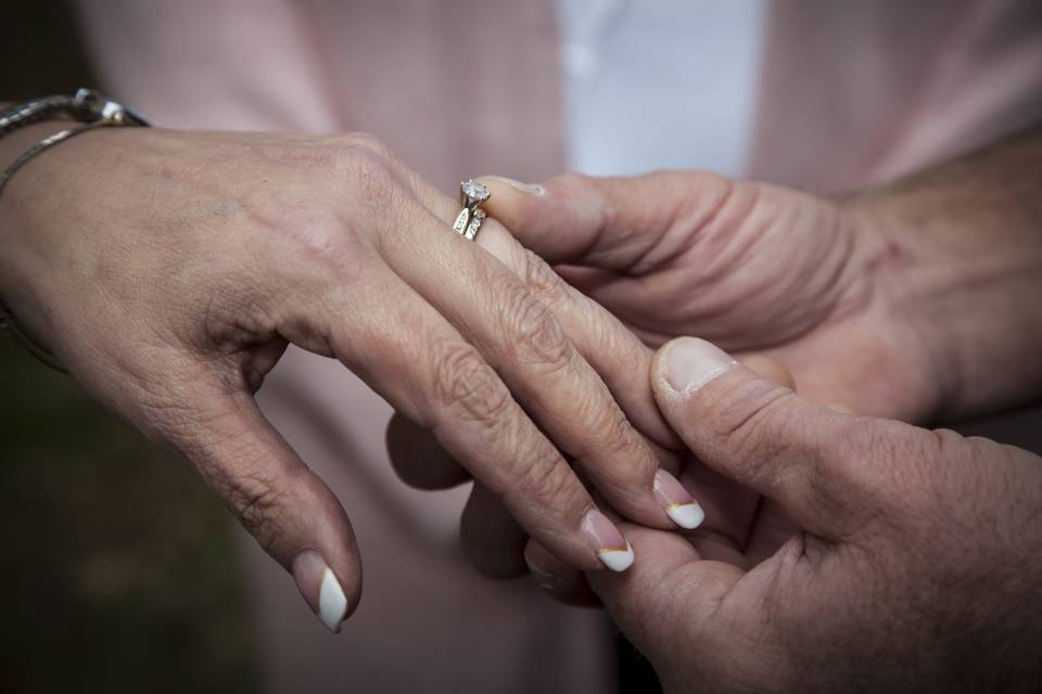 Placing the ring on her finger