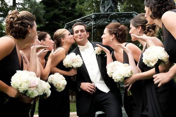 Bridesmaids with the groom