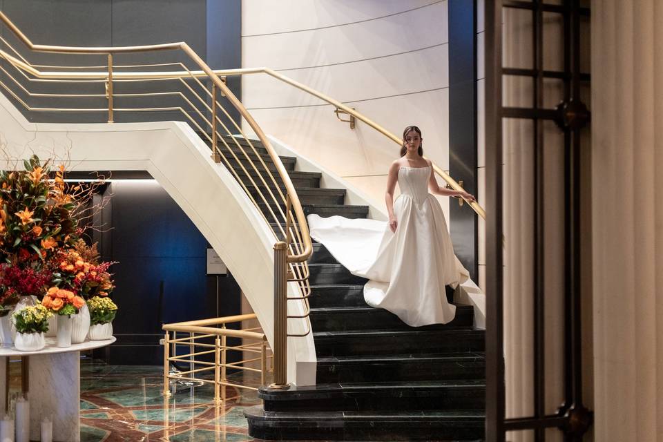 Bride descends stairs