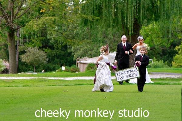 Couple with their bridal attendants