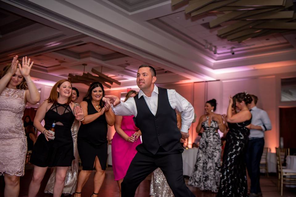 Groom tearing up Dance Floor