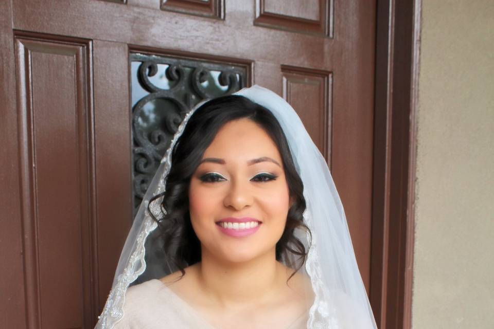 Bride wearing her veil