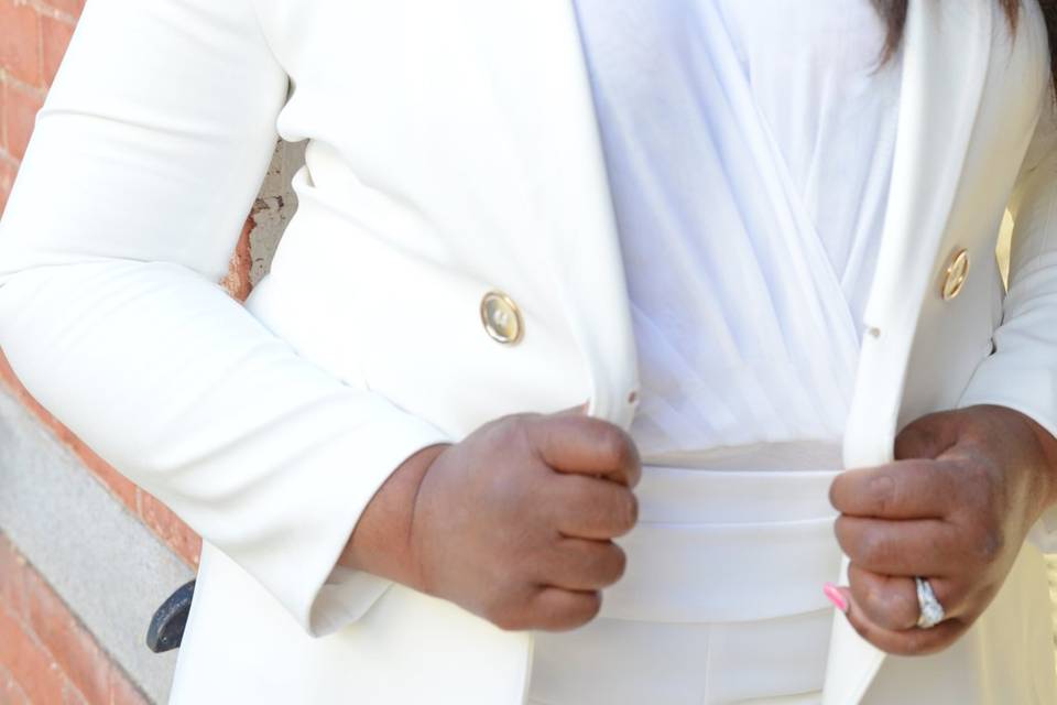 Wedding officiant in white suit