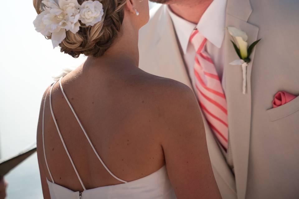 placed curls and texture up do for this beach wedding