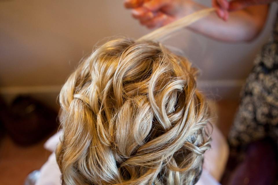 This Bride has lots of long hair, we used the curls to create knots in the hair for a textured up style that will last all day