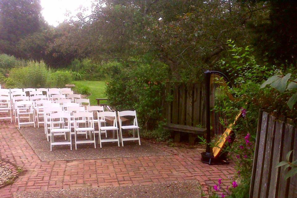 Harp outside at garden wedding