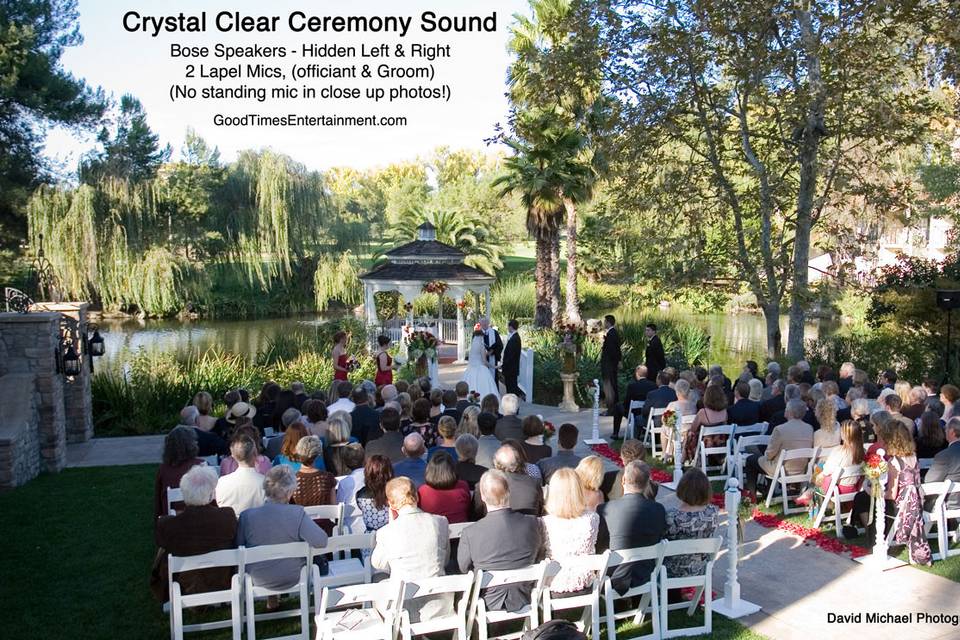 Beautiful garden wedding, two hidden microphones and two hidden speakers for superb sound and beautiful pictures. No standing open mic to pick up the wind. Ceremony music and microphones provided by Good Times Entertainment.