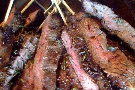 Rosemary-crusted flank steak skewers