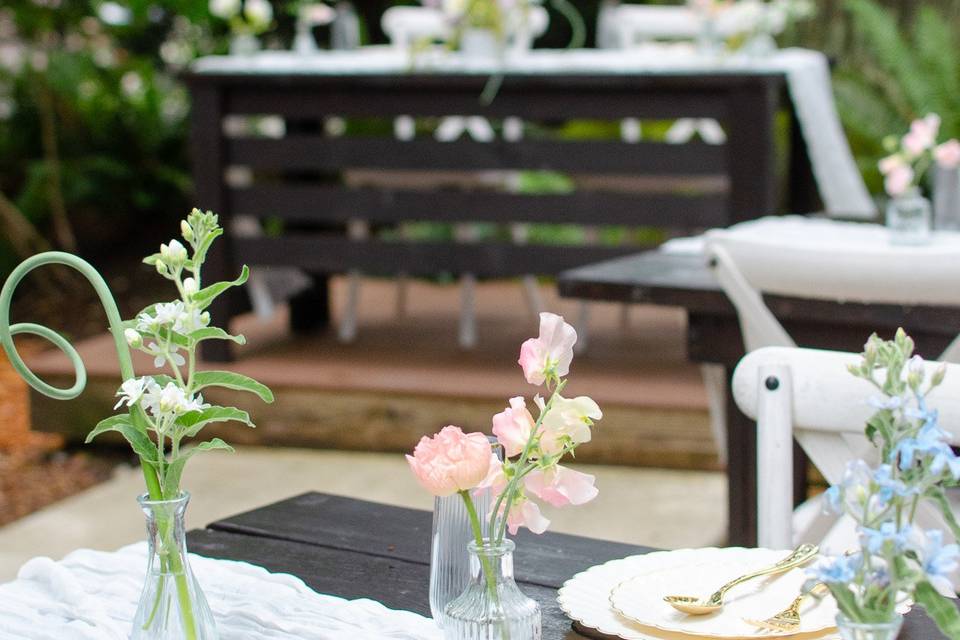 Bud vases on long table
