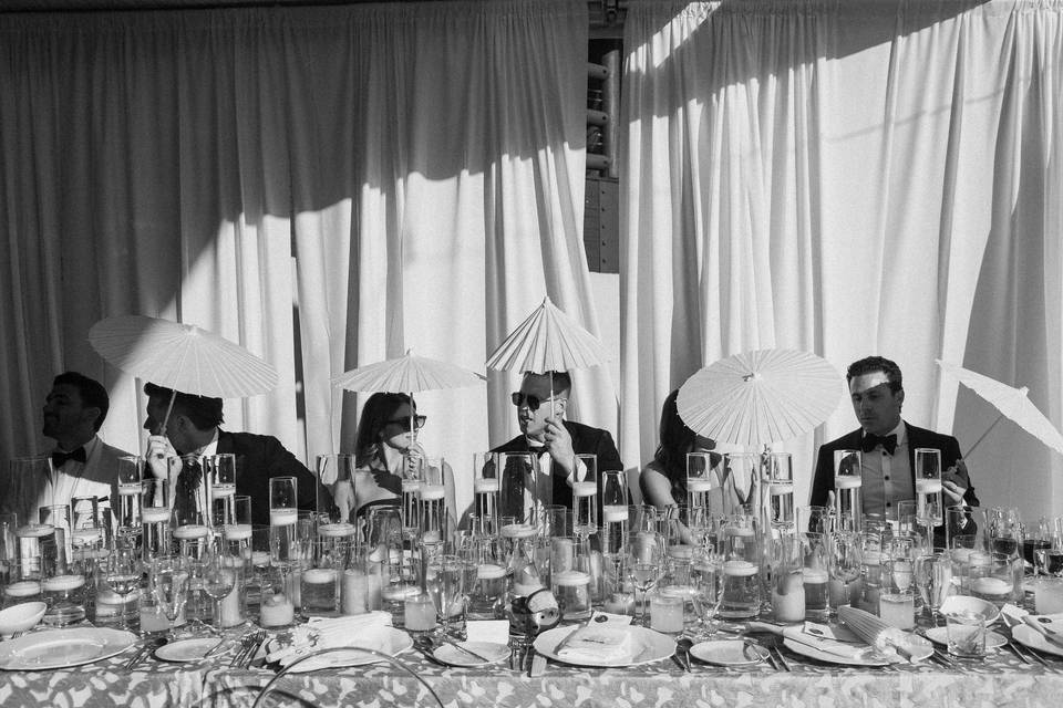 Wedding guests with parasols