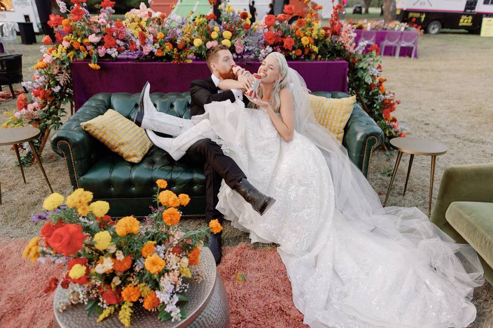 Bride and groom drinking beer