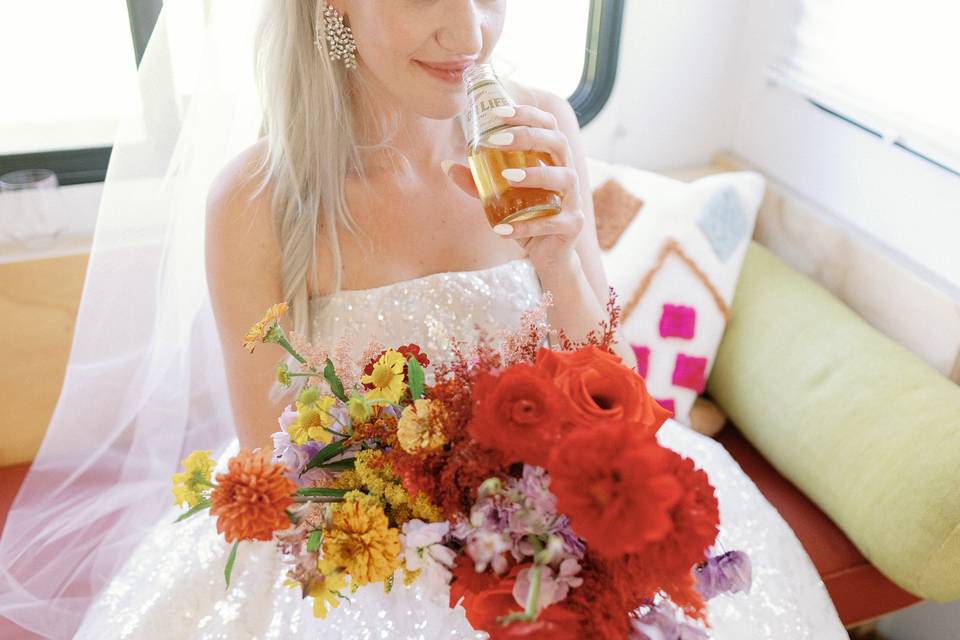 Bride drinking beer