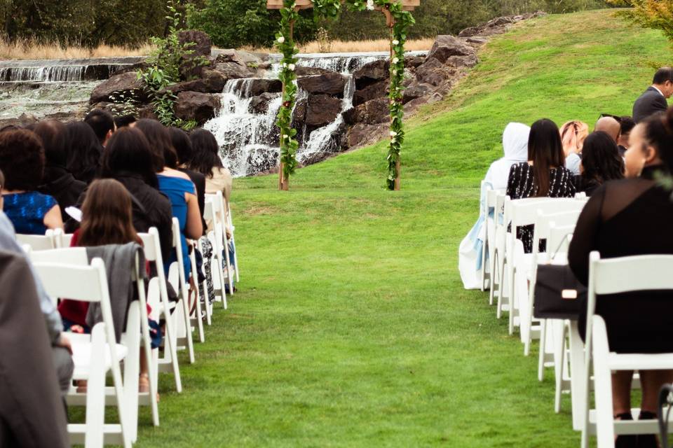 Outdoor waterfall ceremony