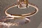 Peach sapphire engagement ring