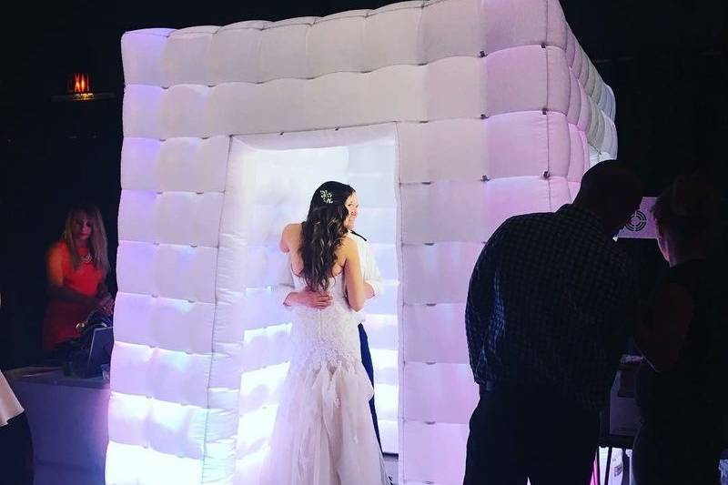 Bride and groom in the photo booth