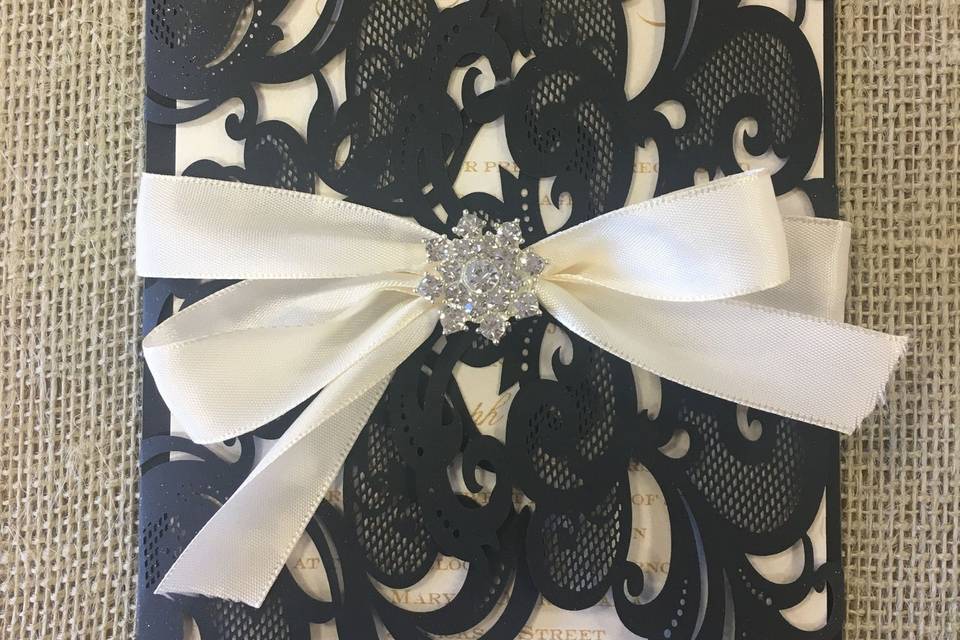 Black invitation with ribbon