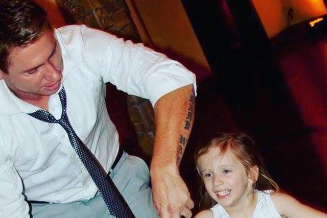 David Newton with a kid