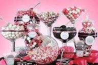 A Candy bar filled with treats in assorted glass jars, (Color of choice candy) party favor