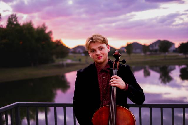 Standing_with_Cello.JPG