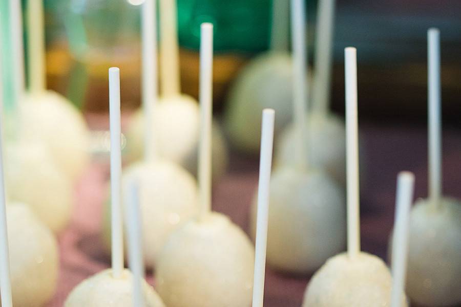 White-chocolate-dipped wedding cake pops