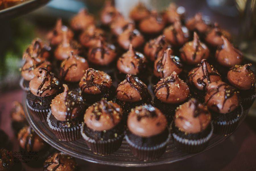 Salted caramel chocolate mini wedding cupcakes on a tier