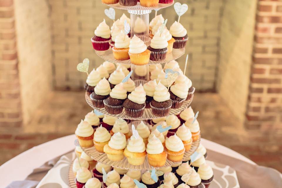 Multiple tiers of cupcakes at a country wedding