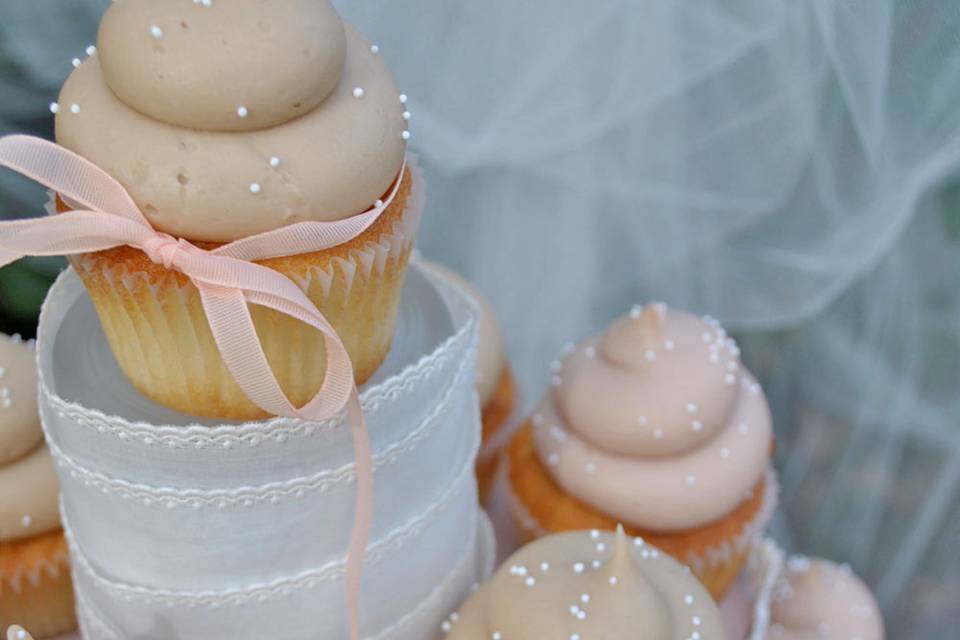 Beautiful display of wedding cupcakes on tiers