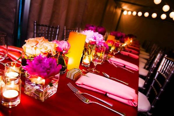 Long tabletop with red, coral and amber.