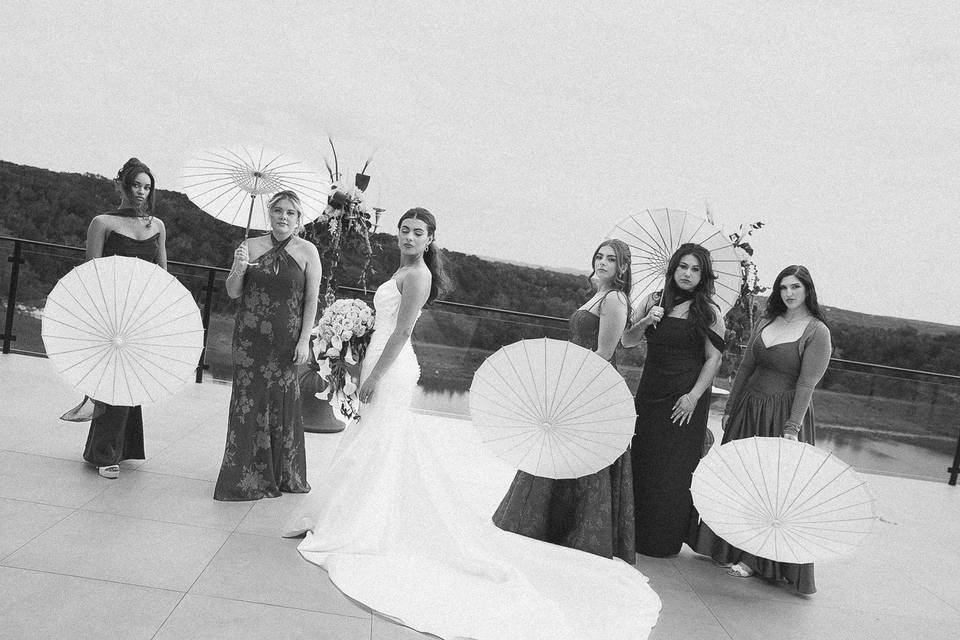 Bridal party with umbrellas