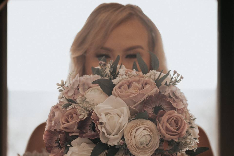Flowers in front of face