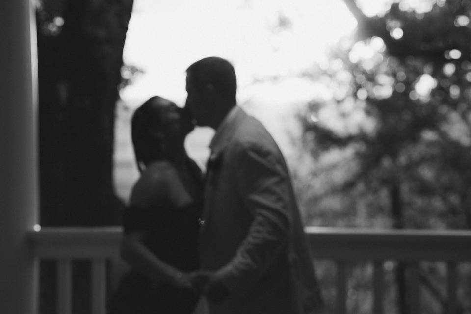 Kiss on forehead at sunset
