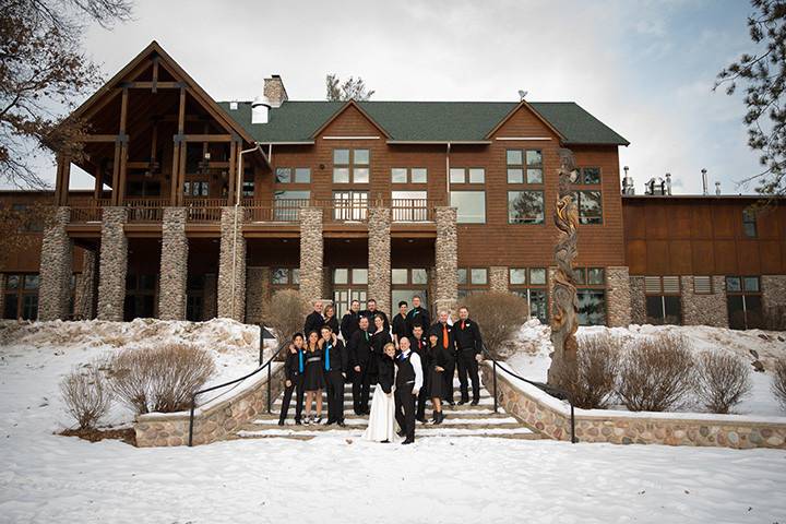 Winter wedding party by Eagle Lodge