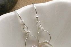Simplicity EarringsBlush colored freshwater keishi pearls on hand-formed sterling silver wire-wrapped loops and finished with sterling earwires.Nothing could be finer!All silver components are sterling silver.Length (including earwire) - 1 1/4