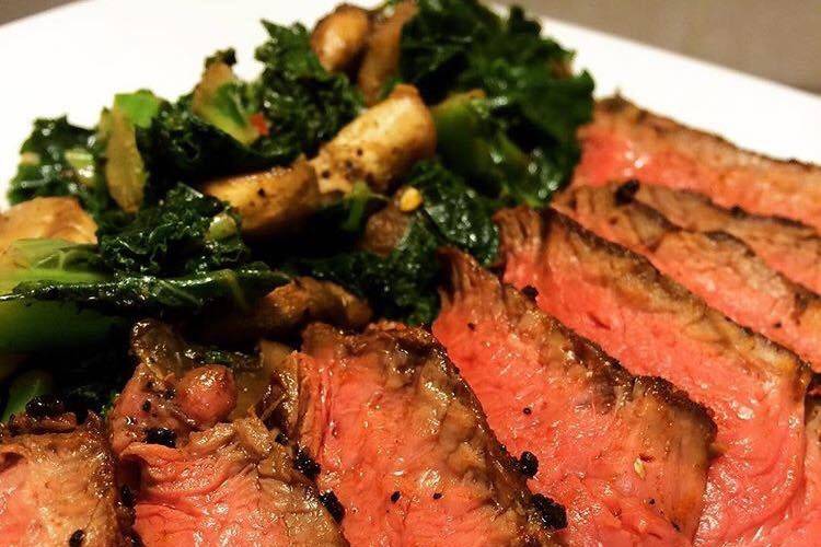 Steak with sautéed kale