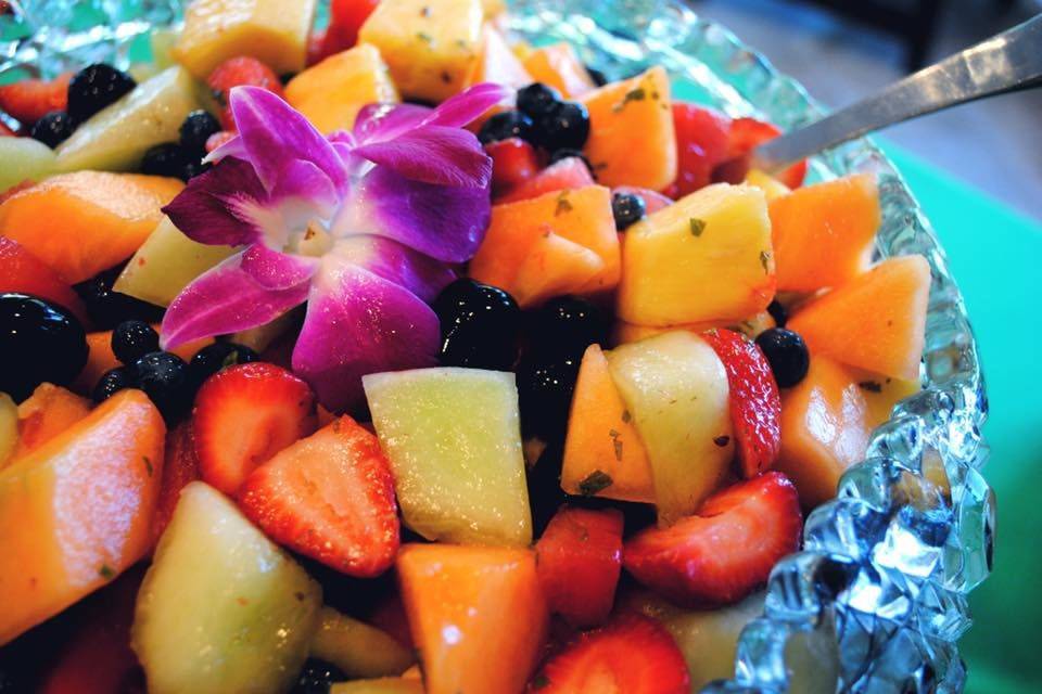 Tropical fruit salad infused with lime, mint and honey