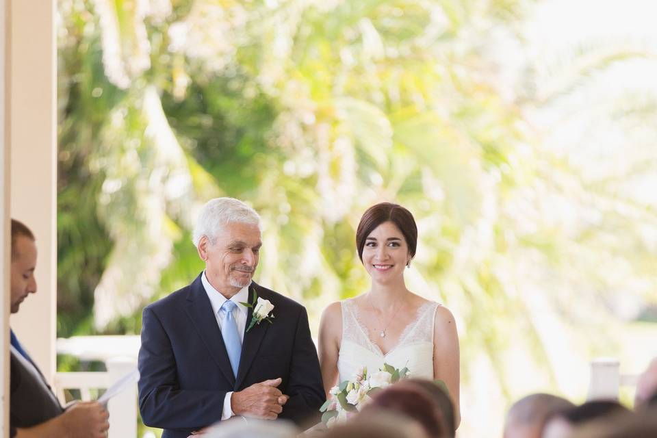 Father and daughter walking down the aisle