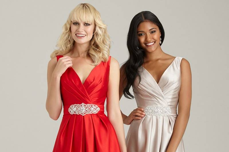Style No. 1300 - available in 50+ colors <br>
Classic and Elegant. This flattering bridesmaids style features a V-neck top with ruched neckline and is finished of with a crystal broach at the natural waistline.