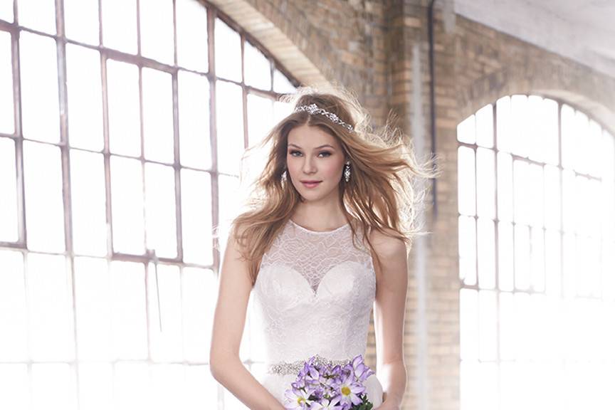 Style MJ162 <br> Swarovski crystals line the neckline and back of this slim-fitting lacy sheath.