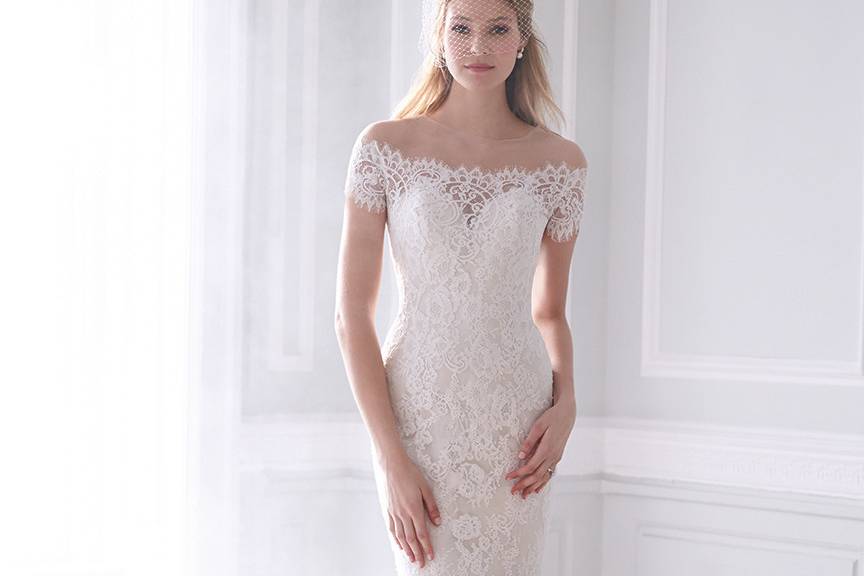 Style MJ172 <br> Cap sleeves and a keyhole back adorn this A-line gown.