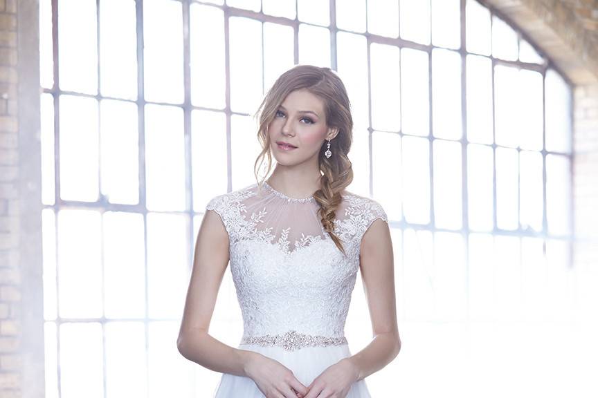 Style MJ164 <br> The lines of this gown are simple and fluid, lightly accessorized by beaded embroidery.