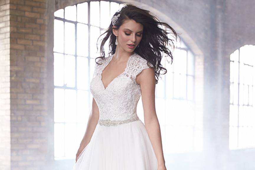 Style MJ171 <br> Lace is the focal point of this mermaid gown.