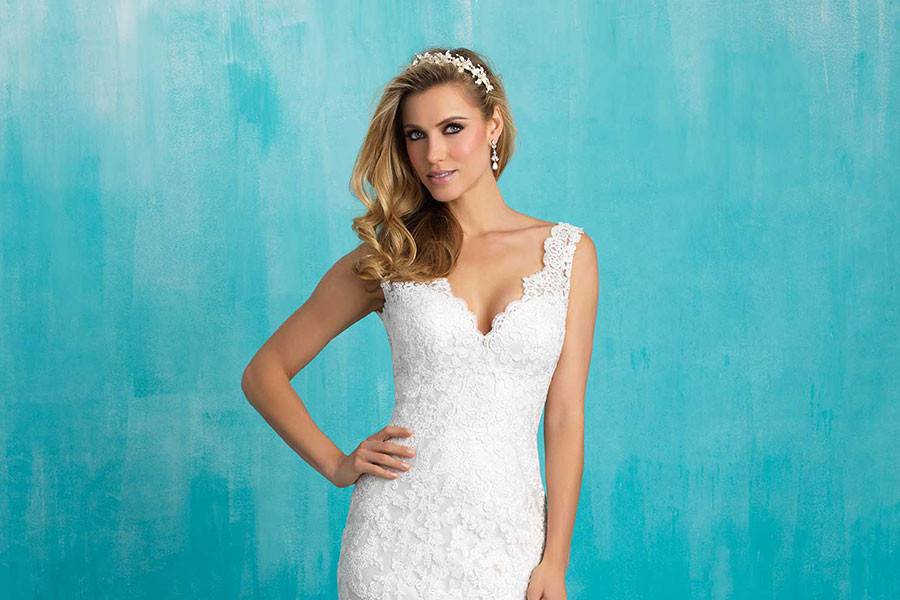 Style 9304 <br> Delicate rows of lace appliques cover the fine English net of this slip gown.